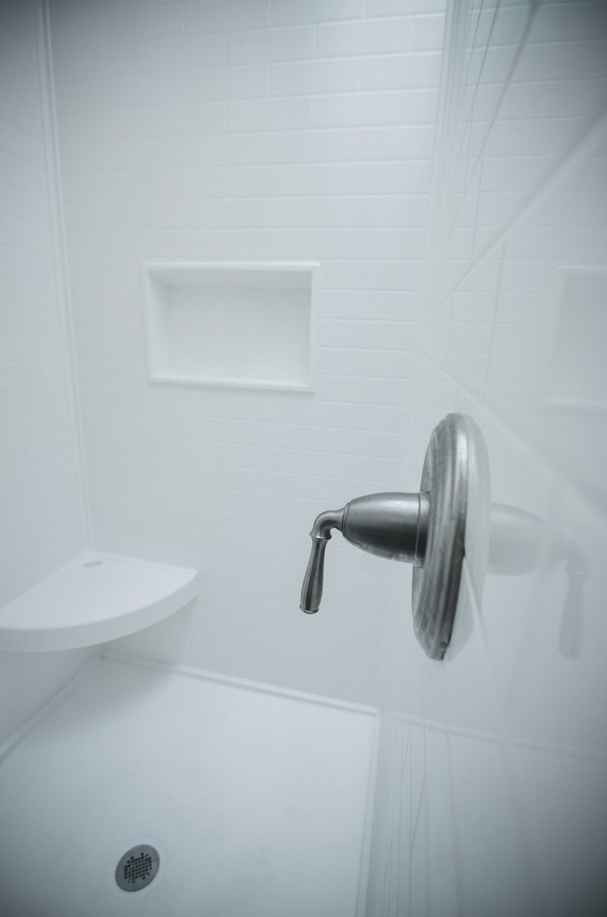 An Alternative To Tile Shower Walls: Solid Surface Shower Wall Panels